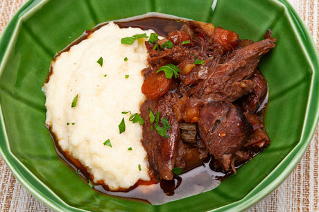 Creamy Oven-Baked Cheese Polenta with Braised Nduja Lamb Shanks