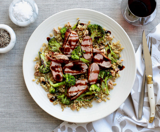 Crispy Skin Duck with Farro, Charred Broccoli & Giusti Balsamic Glaze